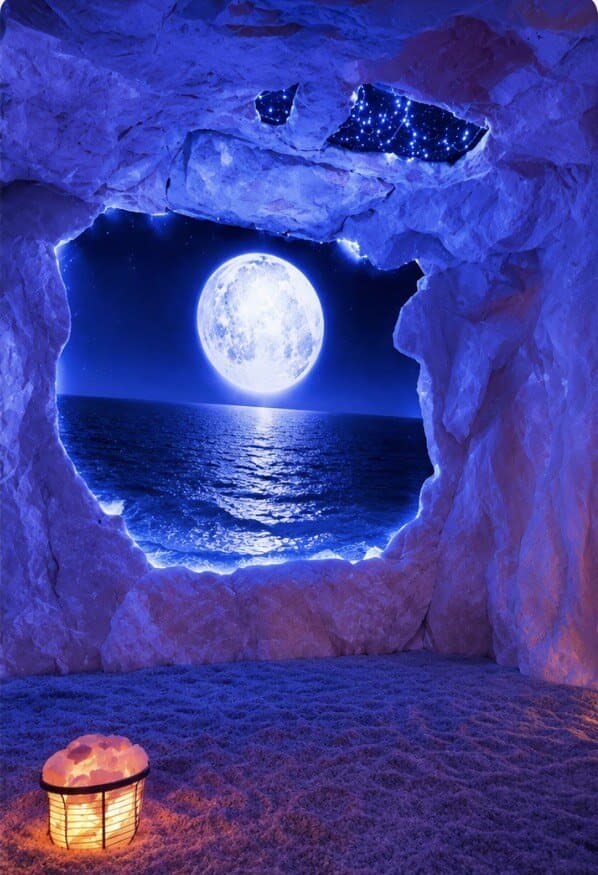 The moonlit ocean window glowing inside the salt cave